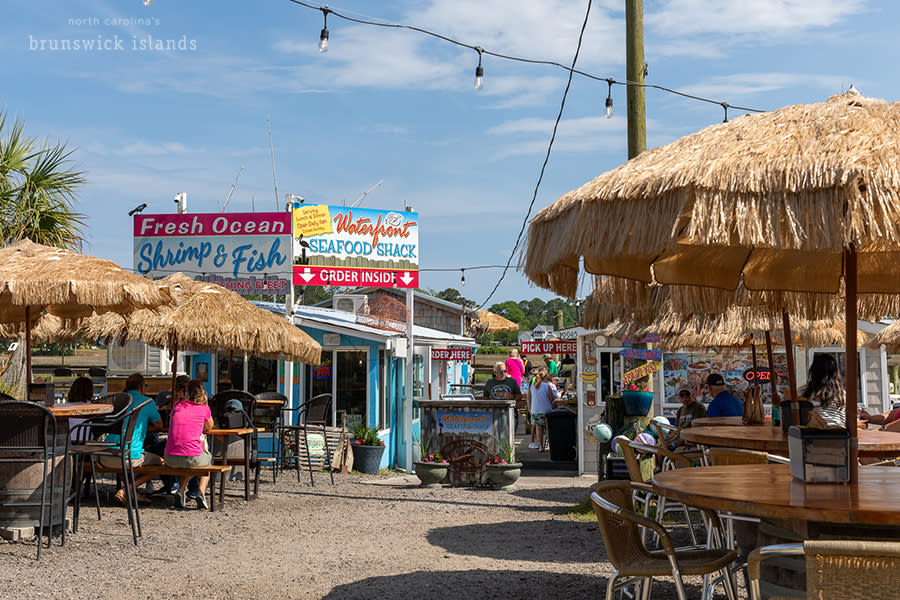 outdoor seating at a waterfront seafood restaurant in Calabash, NC