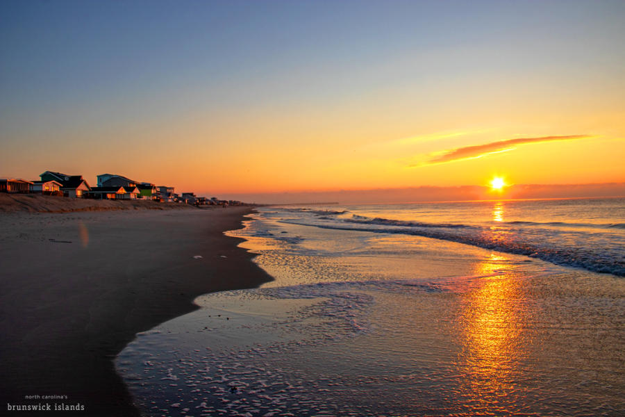 a winter sunrise over the ocean on Oak Island, NC