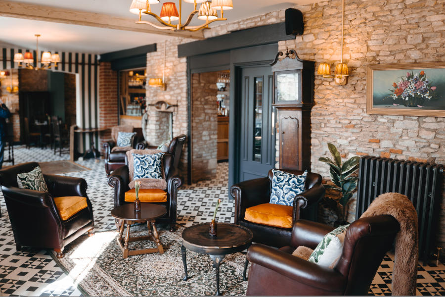 Market Tavern dining room with lots of pictures on the wall.