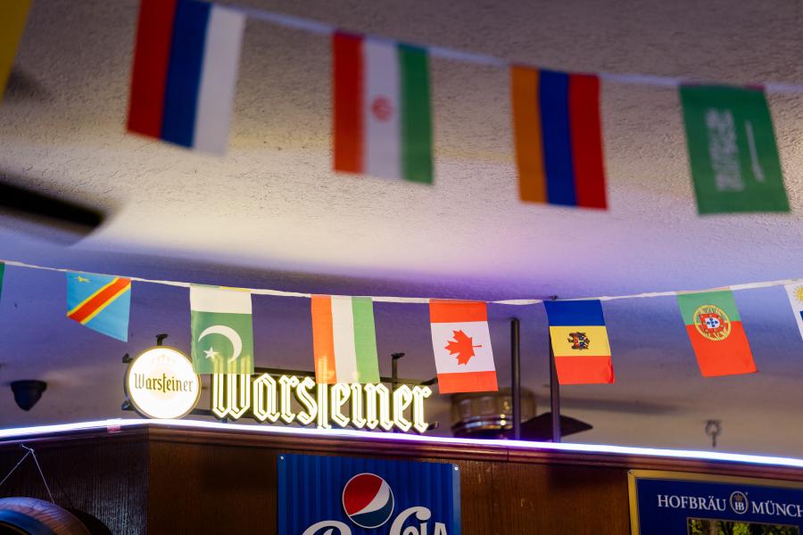 flags strung across Haus Murphy's for Oktoberfest