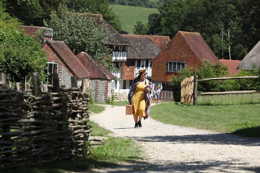 Lady with picnic hamper at Weald & Downland