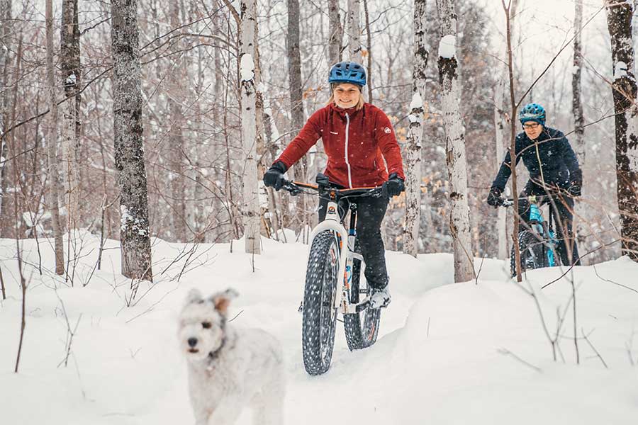 A couple enjoying fat tire biking at Swedetown Trails