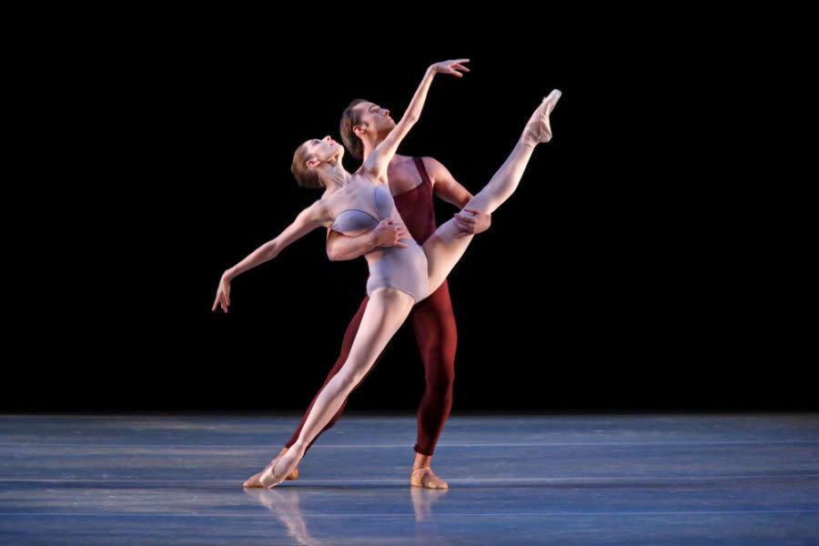 Two ballerinas dance across the stage at the Rozsa Center for the Performing Arts