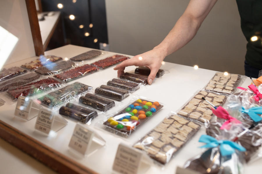 assorted chocolates in a candy case