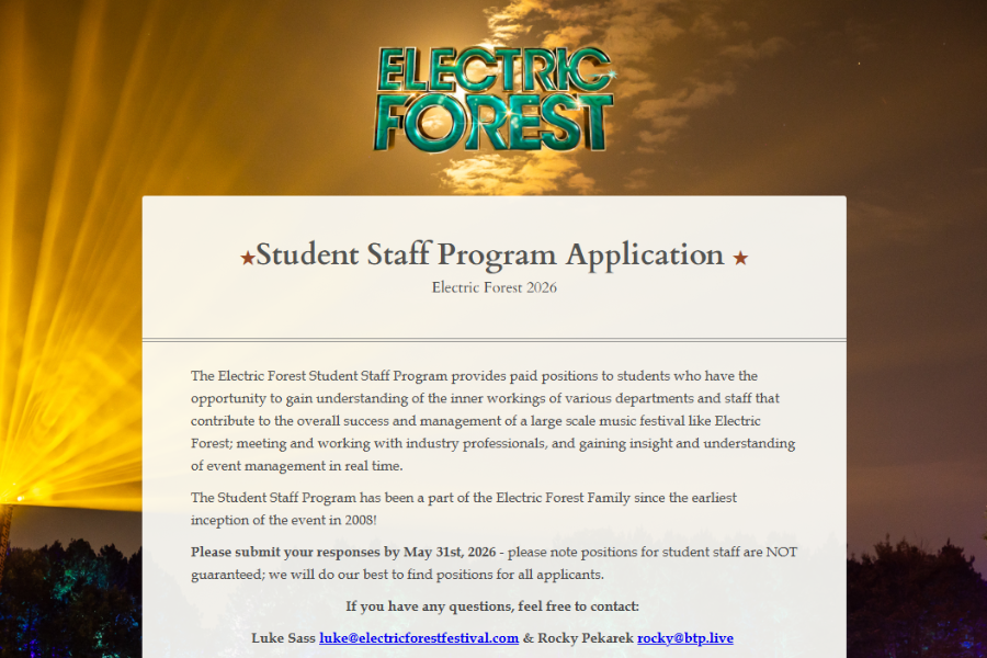 Electric Forest Student Staff Program Application for 2026 displayed on a background with glowing yellow lights and a logo at the top."