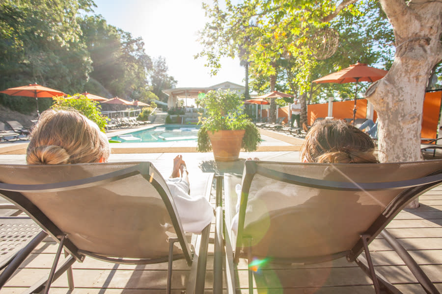 women lounging at pool at Indian Springs Resort