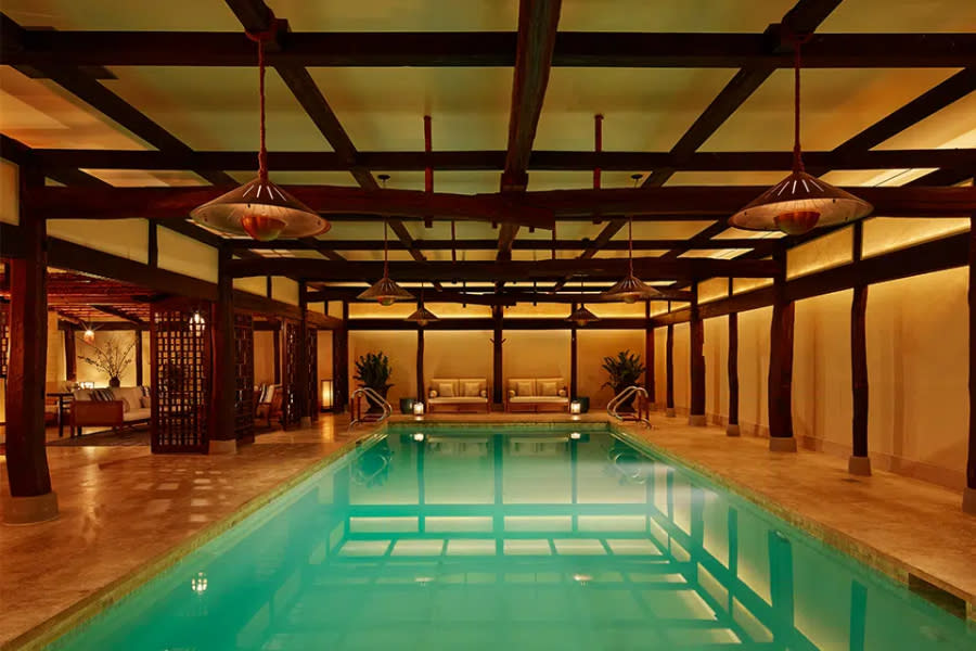 The pool at Shibui Spa at The Greenwich Hotel has sultry lighting and calming accents