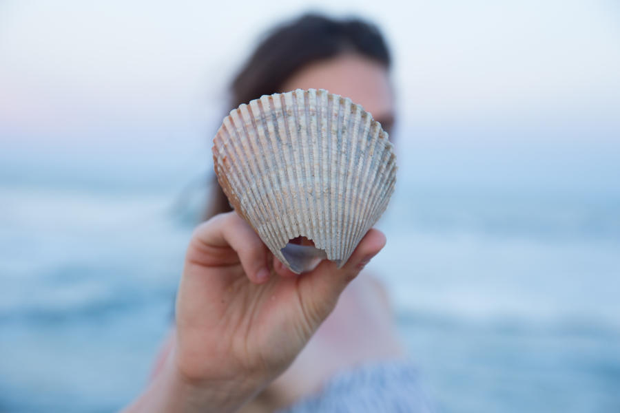 Girl Holding Shell