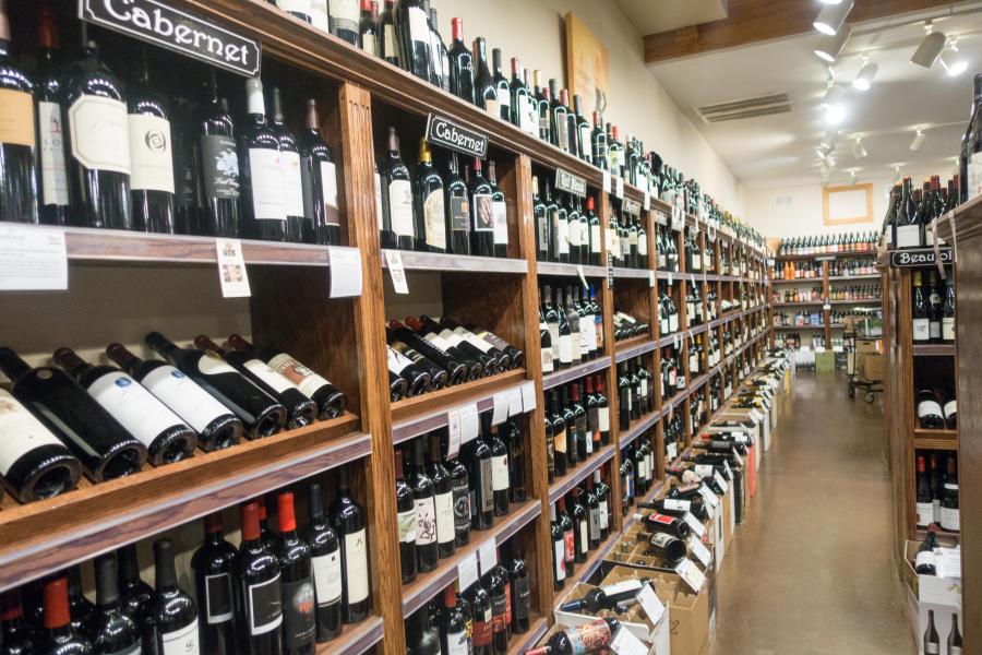 wine bottles on display shelves