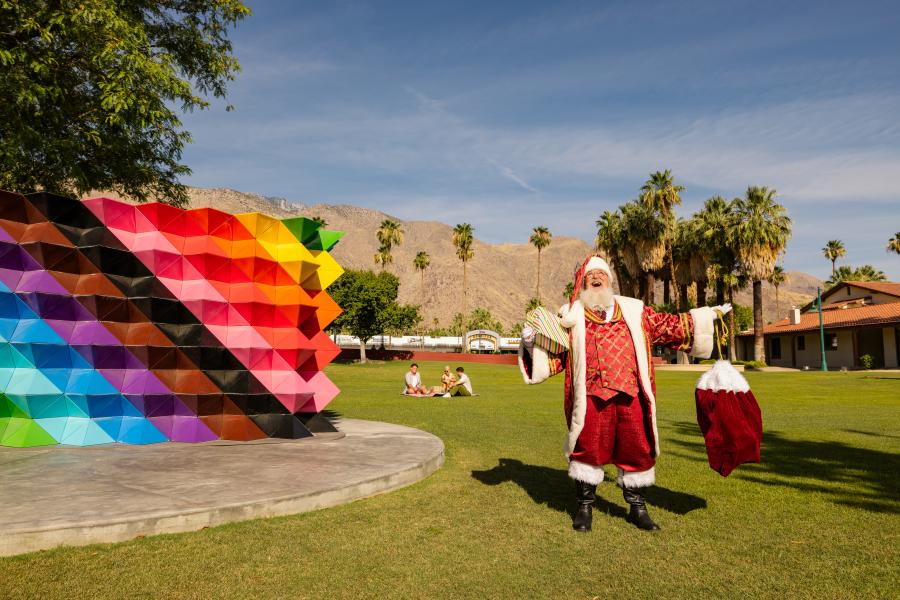 Santa and the Palm Springs LGBTQ+ monument.