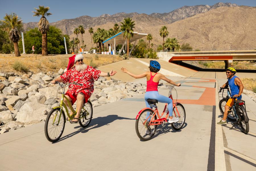 Santa riding on a bike at the CV Link in Palm Springs
