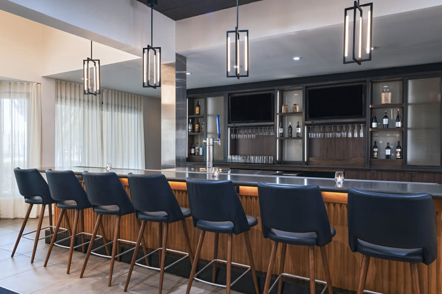 Hotel bar with barstools