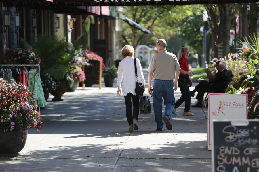 couple strolling around on broadway