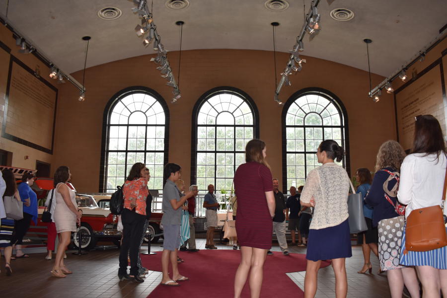 Group getting tour of Saratoga Automobile Museum