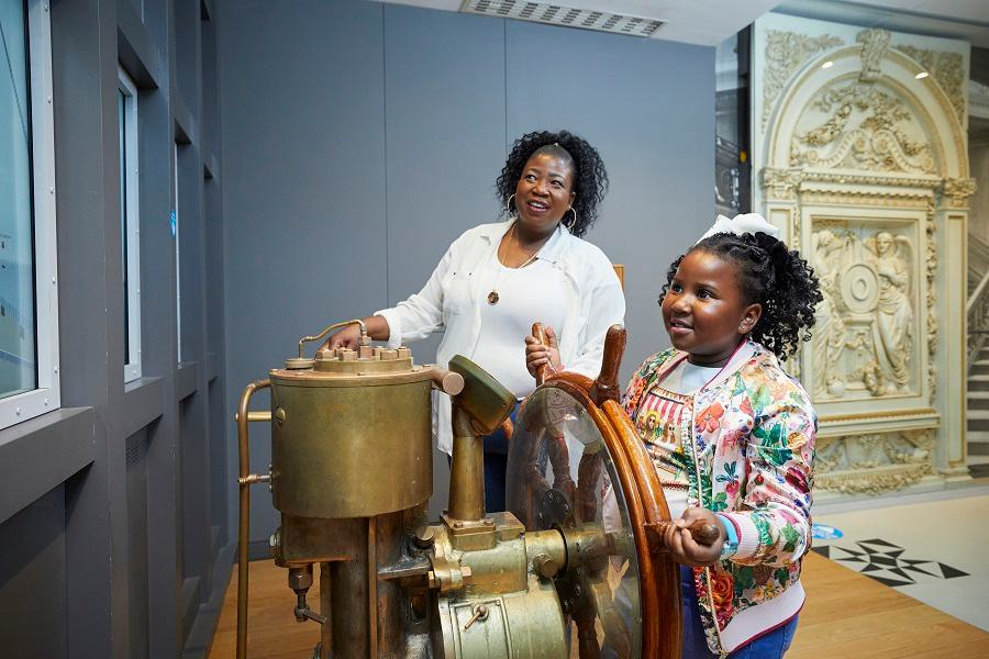 Family looking at exhibits in SeaCity Museum