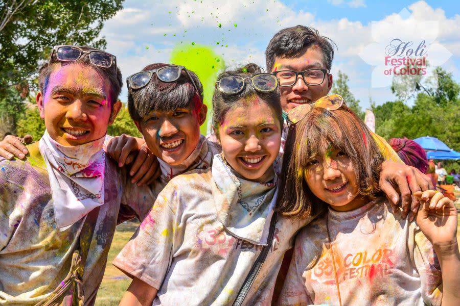 Five friends at Holi Festival of Colors