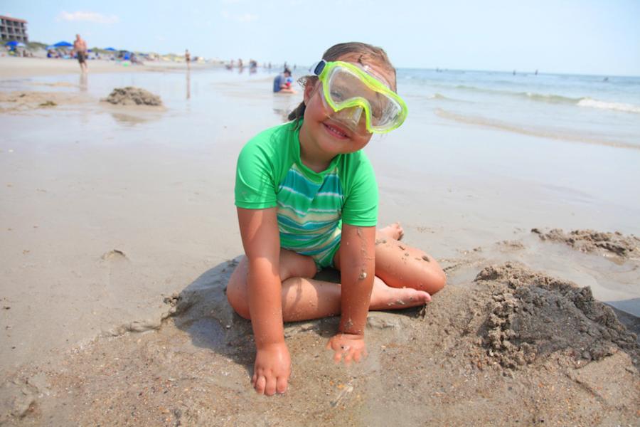 Girl with Goggles Playing on Carolina Beach
