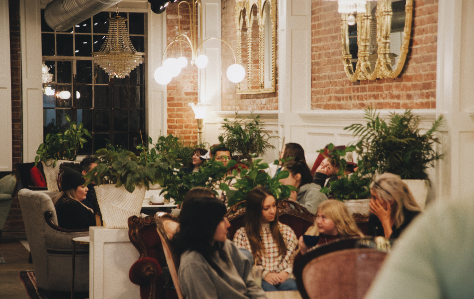 People sitting in couches at a coffee shop