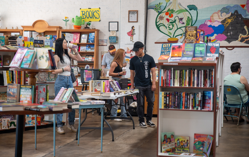 Wide shot of customers browsing bookshelves at The Floating Bookshop