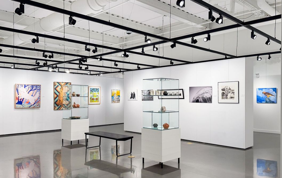The interior of Exhibit C Gallery filled with artwork and artifacts
