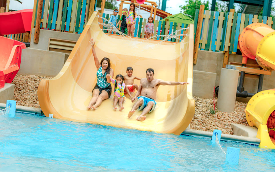 Family on waterslide at Schlitterbahn.