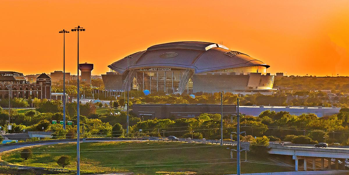 AT&T Stadium at sunset.