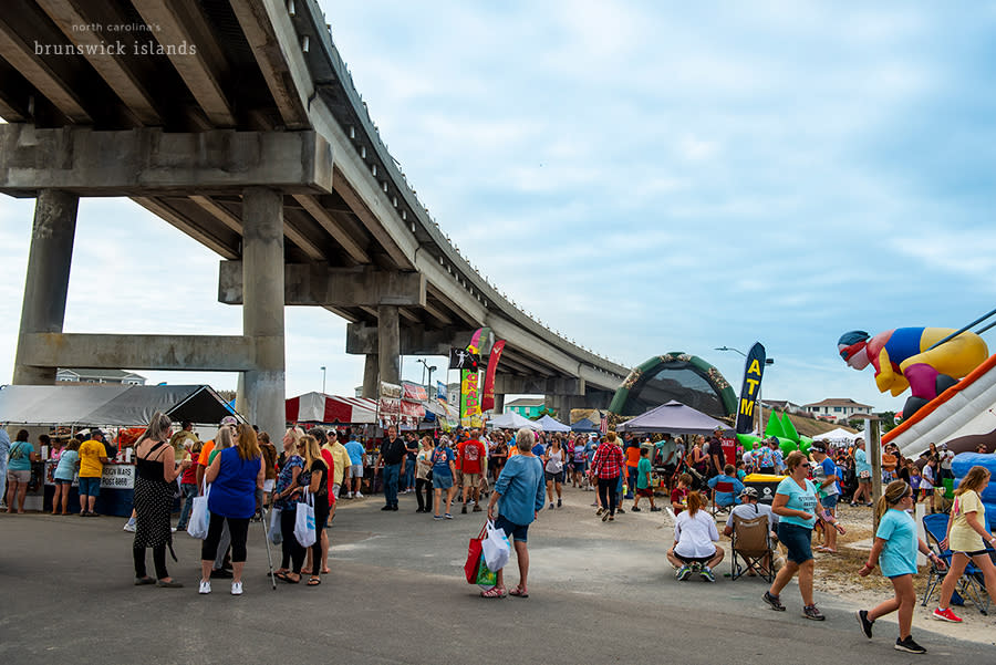 a festival held under a concrete bridge - NC Festival by the Sea in Holden Beach, NC