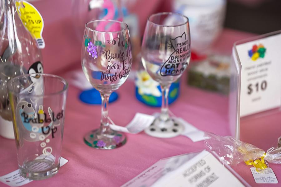 A selection of painted wine glasses and beer glasses