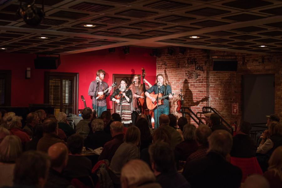 Folk band playing to crowd at Caffe Lena in Saratoga