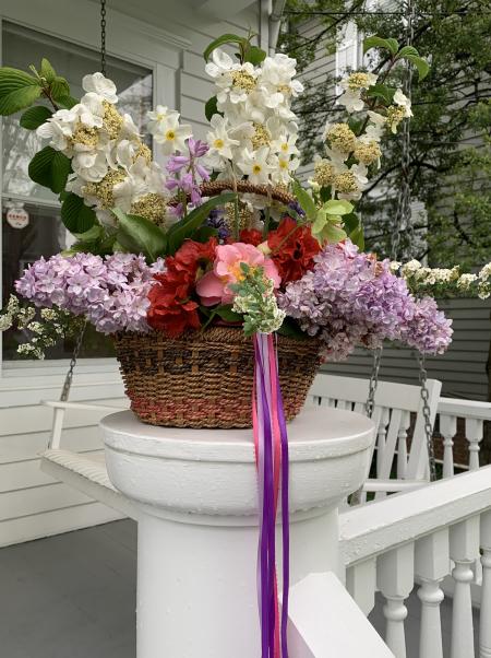 A May Day Basket on a porch post