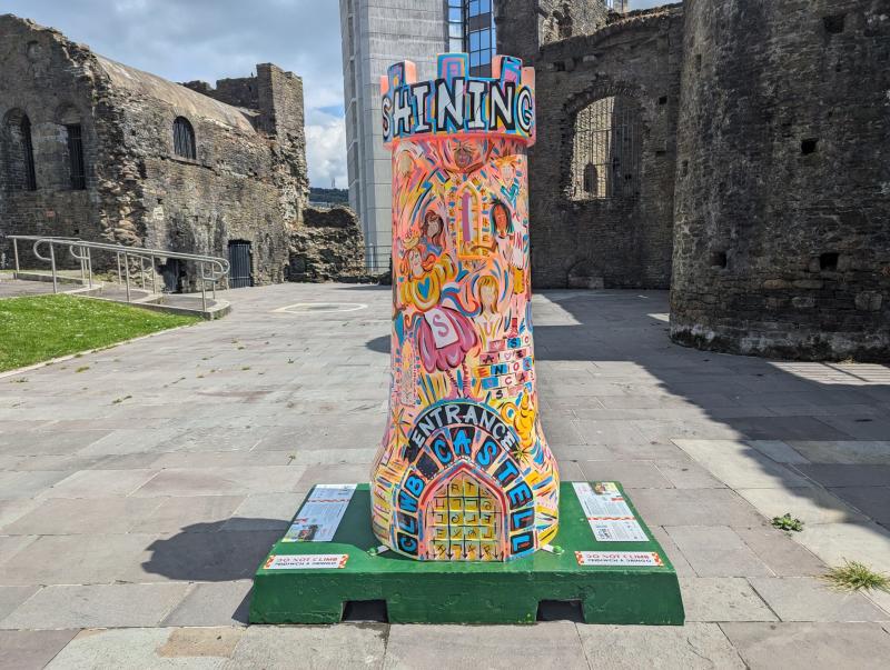 A decorated model of a castle outside Swansea castle.