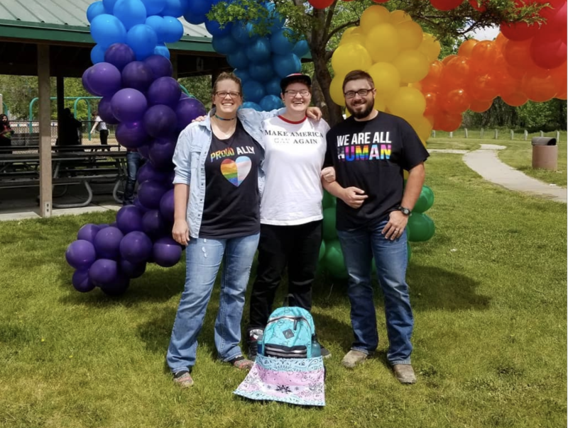 People Posing For A Photo At The Casper Pride Fest
