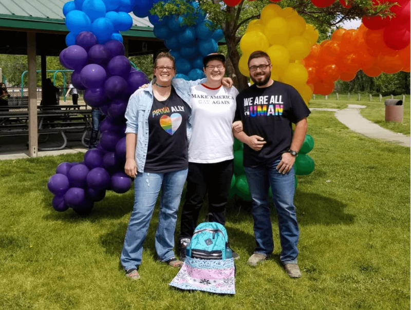 People Posing For A Photo At The Casper Pride Fest
