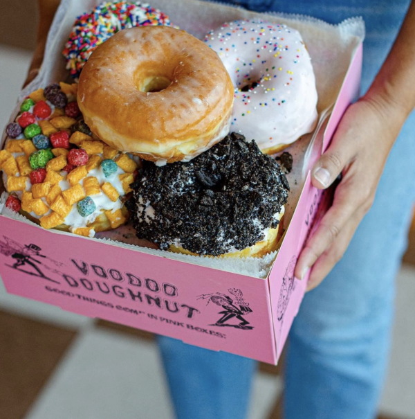 A box of donuts from VooDoo Doughnut in Houston, TX