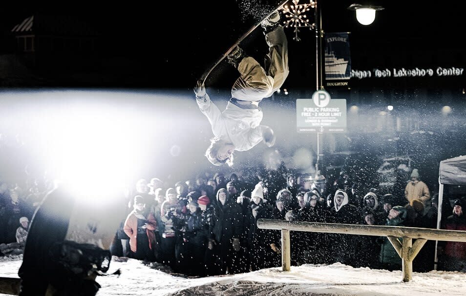 Snowboarder performs stunt at Jibba Jabba.