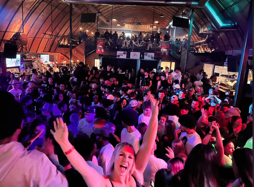 People dancing inside the Lumberyard