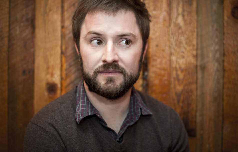 Portrait of comedian Adam Cayton-Holland.