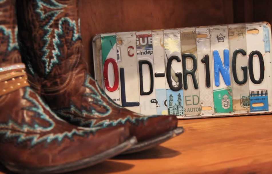 Cowboy boots and license plate at a store in Lakewood, Colorado