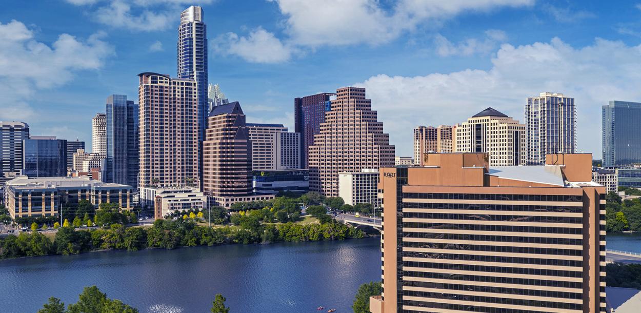 Exterior of Hyatt Regency Downtown Austin Hotel and Lady Bird Lake