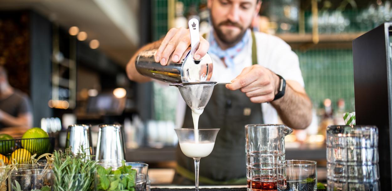 Bartender making a cocktail at Kalimotxo in Austin Texas