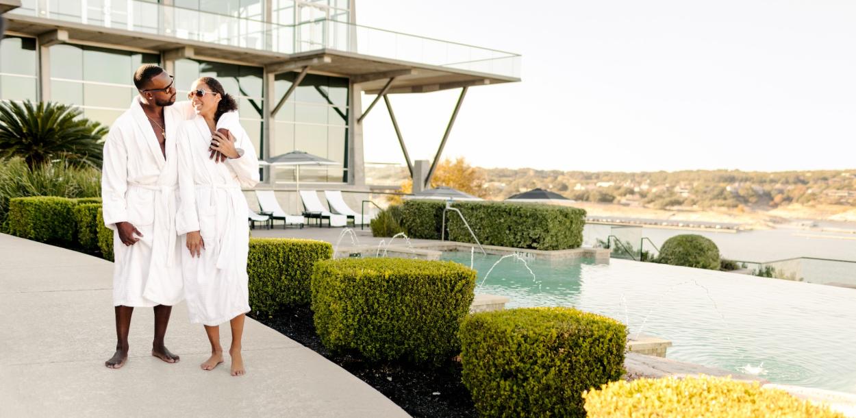 couple in robes at lakeway resort and spa in austin texas