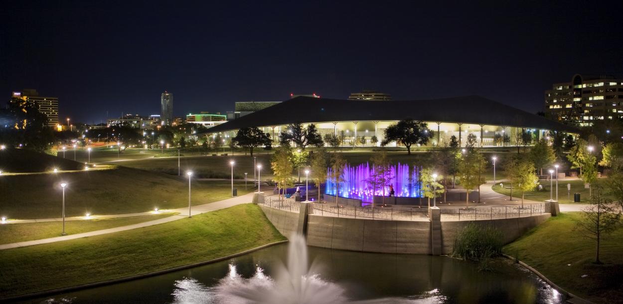 Palmer Event Center and fountains at night