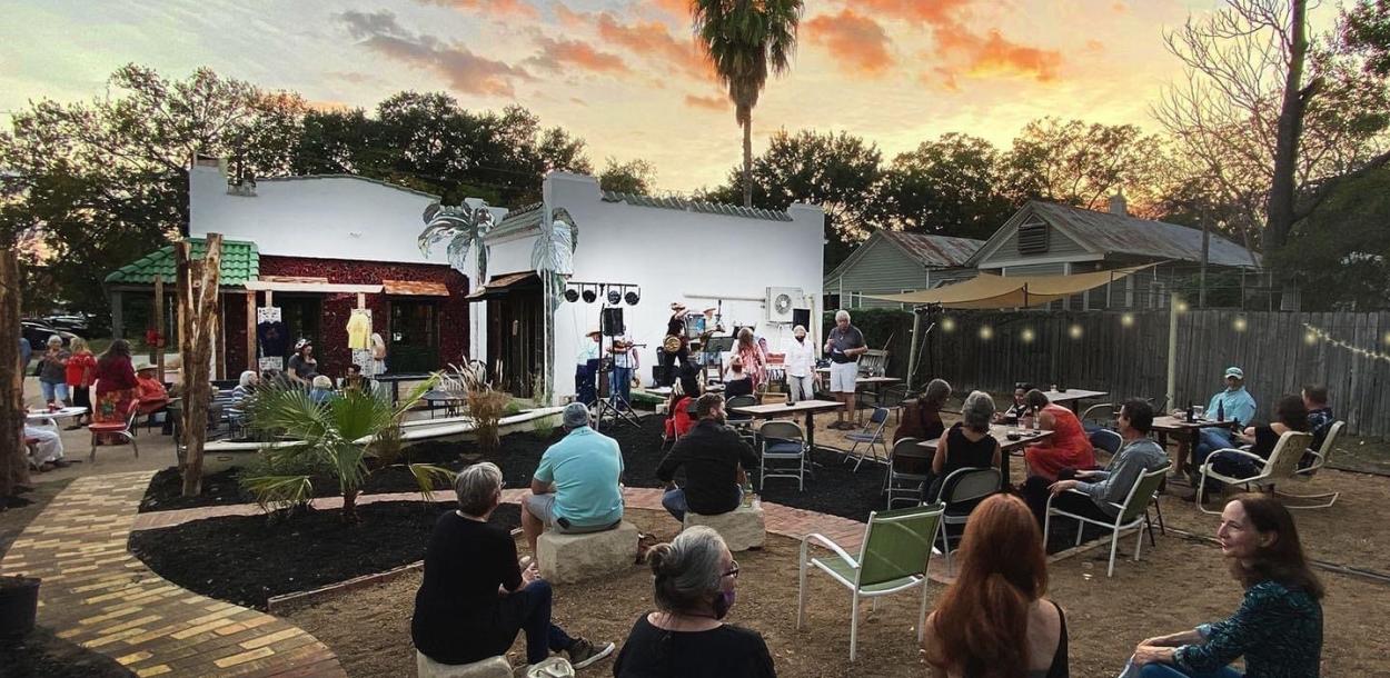 Rio Social House patio with live music at sunset in Smithville Texas