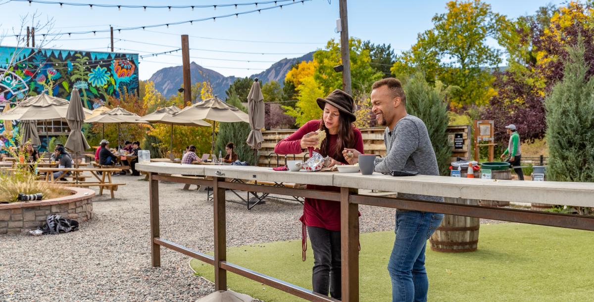 Couple Eating Outside During Fall In Boulder, CO