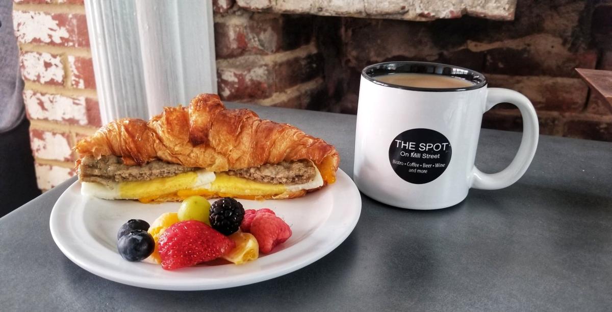 The Spot on Mill Street Breakfast Sandwich, fruit and coffee