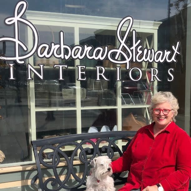 Susan Hoechner in front of Barbara Stewart Interiors