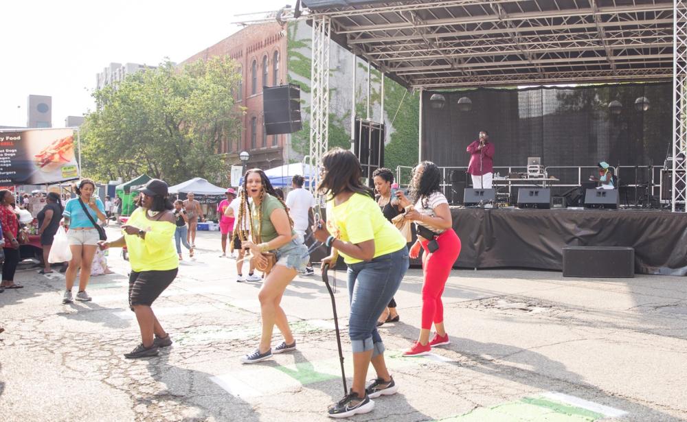 women dancing at african american downtown festival