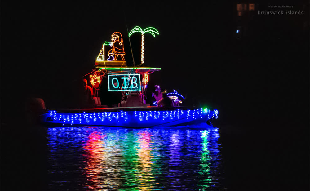 boat decorated in Christmas lights