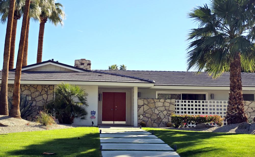 Canary Orange colored door at 2486 Camino Real, Palm Springs