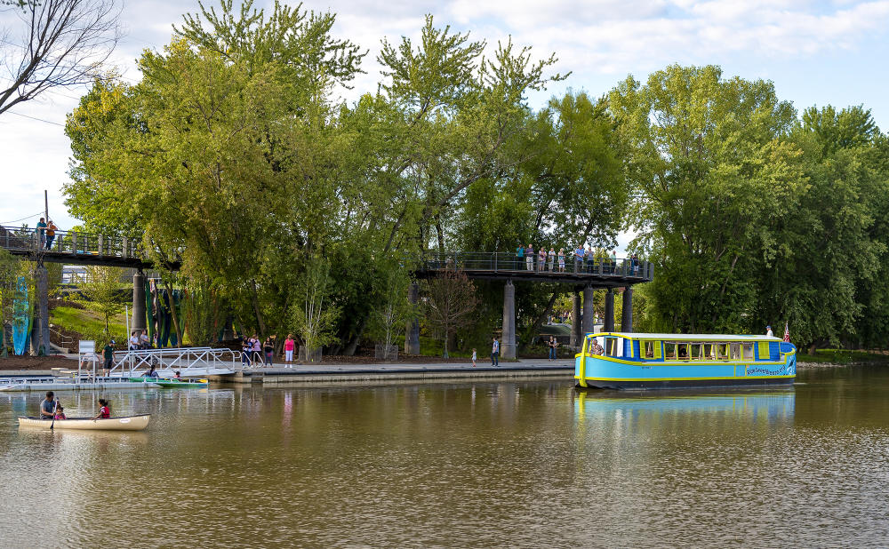 Sweet Breeze canal boat on the St. Marys River in fort wayne